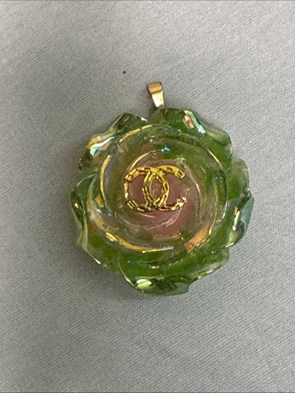Green Flower Pendant Necklace with Gold Logo Accent
